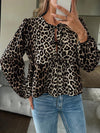 Blouse à manches longues imprimée léopard avec nœud pour femme